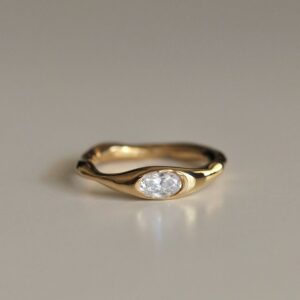 Asymmetric oval gold ring